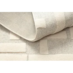 Wool rug with a loft character, structured in beige shade