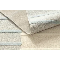 Practical FLUX 461.3 wool rug for bedrooms or living areas