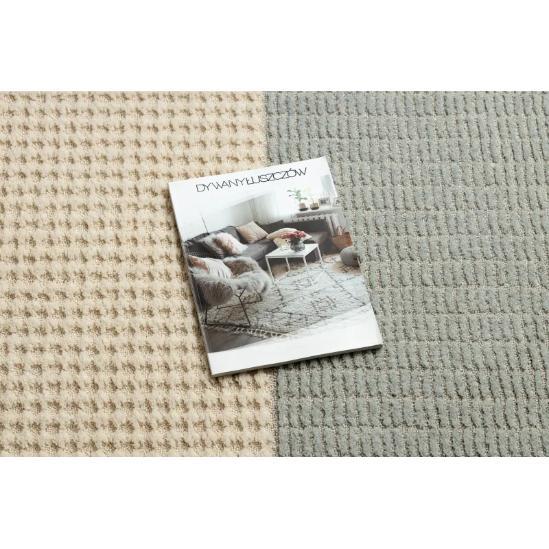 Blue and cream wool rug with a structured geometric design in loft style