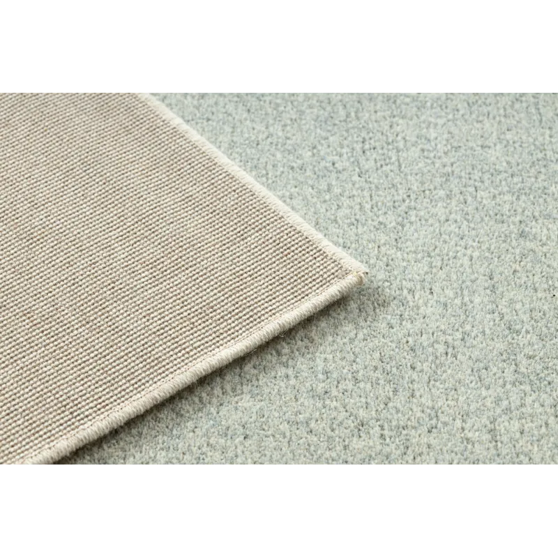 FLUX 461.10 wool rug with a loft-style texture in blue and cream