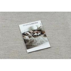 Stone-colored sisal rug - a chic addition to any interior space