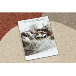 Cream rug with terracotta patterns, perfect for contemporary interiors