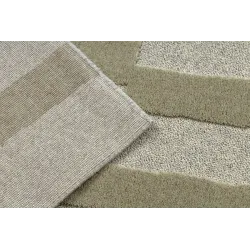 Rug with a geometric texture, perfect for living rooms or bedrooms