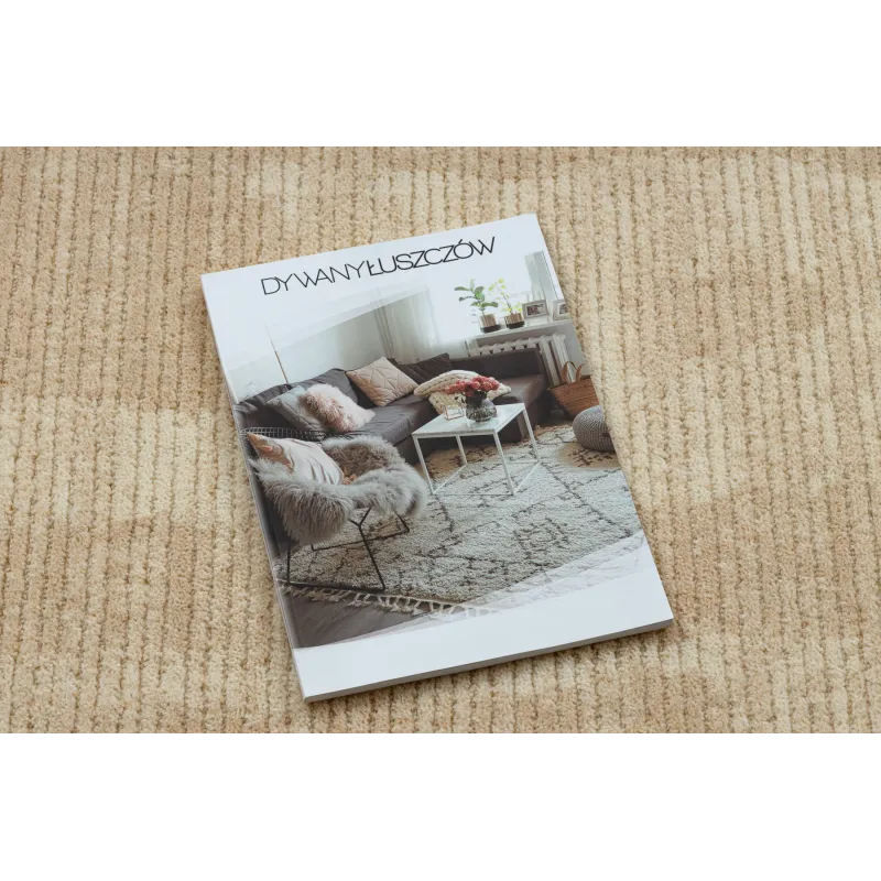 Cream FLUX rug with abstract pattern, perfect for contemporary spaces