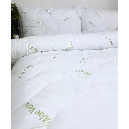 Aloe Vera green French duvet set with two pillows, perfect for a cozy bedroom