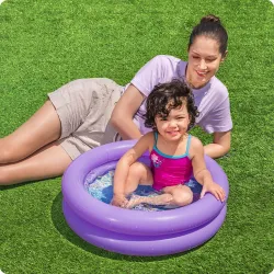 Bright teal inflatable pool, great for outdoor summer activities