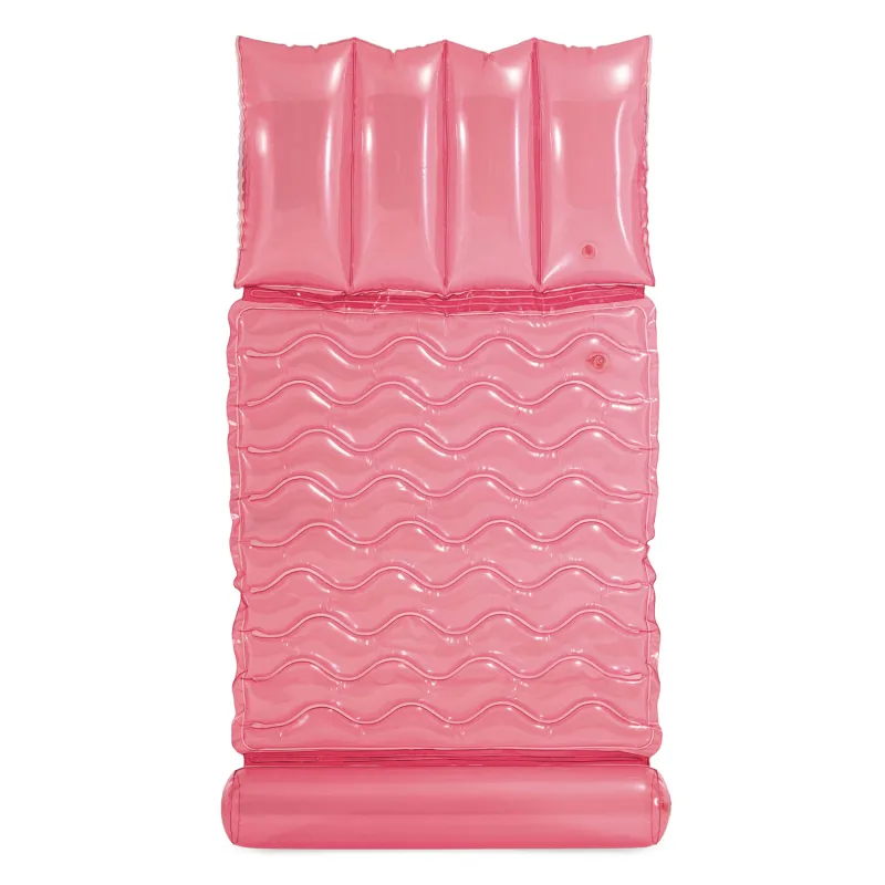Swimming mattress in pink, great for summer days by the water
