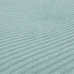 Round footstool and extra seat in soft corduroy